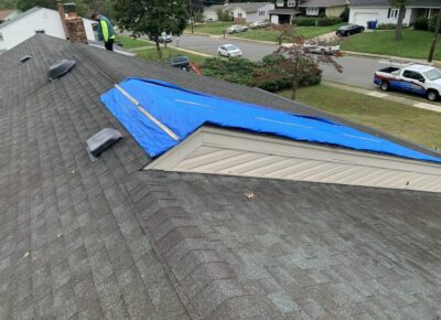 storm damaged roof in Toms River, New Jersey
